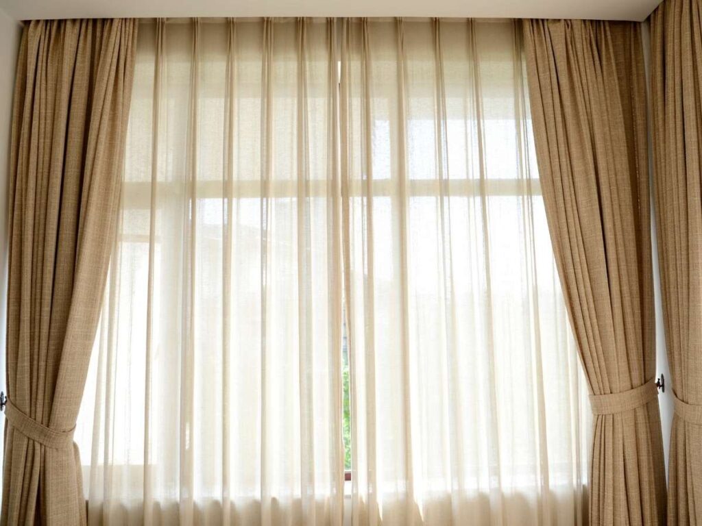 sheer curtains with heavier drapes