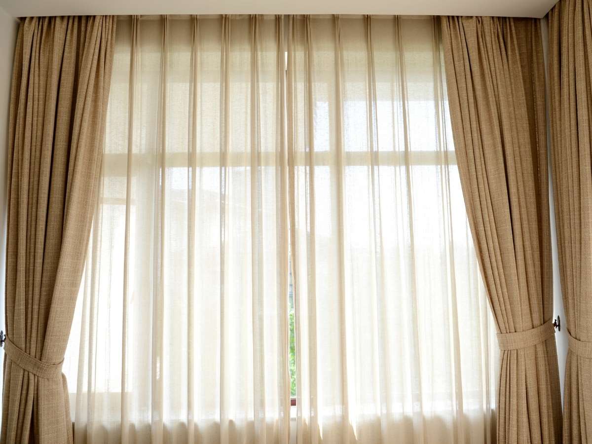 sheer curtains with heavier drapes