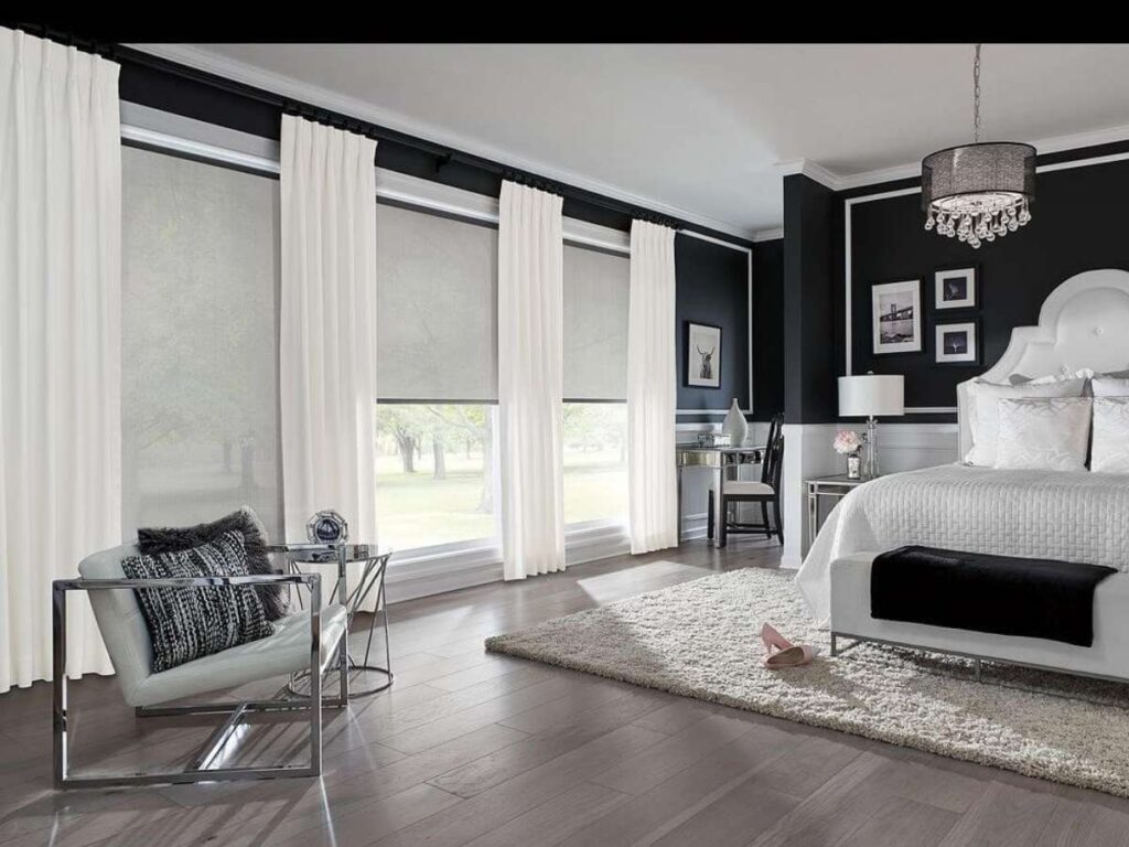 Installing drapery in bedroom helps in better sleep and function by providing light and temperature control, as well as sound dampening.