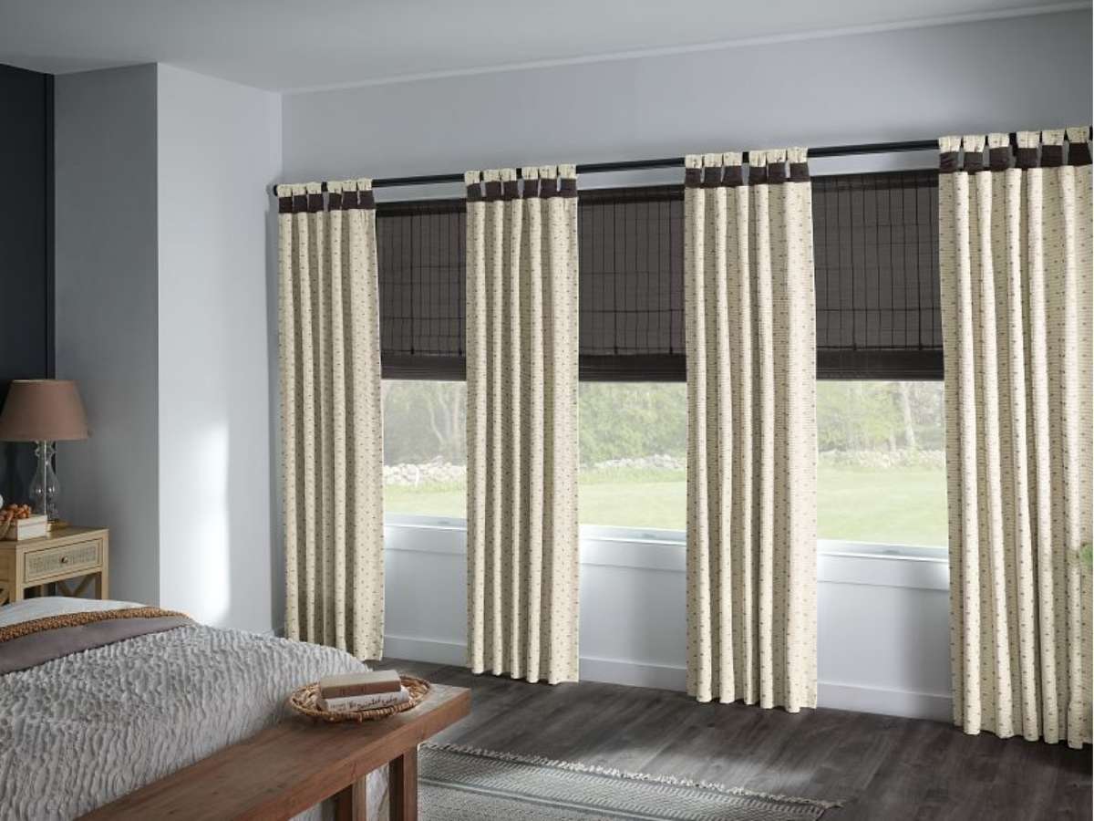 Graber designer drapery offering soft light filtration in contemporary bedroom