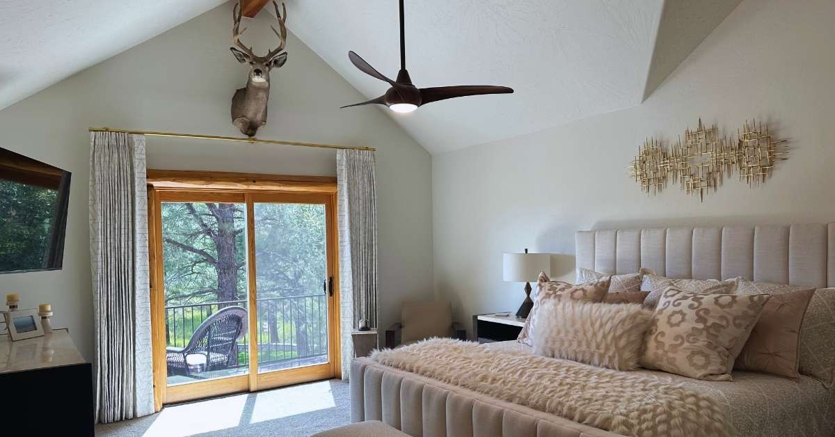 Beautifully crafted Carole Fabrics drapery installed in a Flagstaff, AZ mountain lodge cabin, adding a touch of elegance to the natural setting.