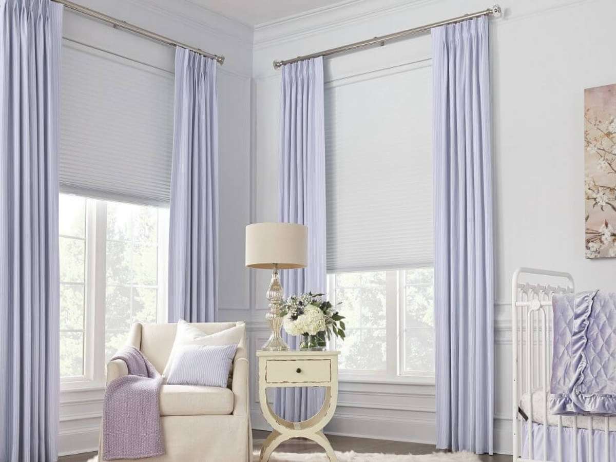 Layered window treatments allow for versatile light control.