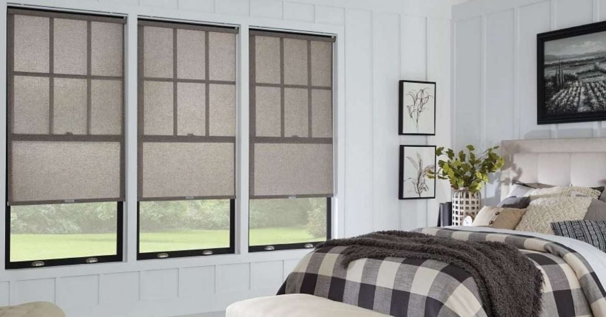 Here are optimized alt text options for minimalist roller shades: "Graber minimalist roller shades providing sleek window coverage in modern bedroom
