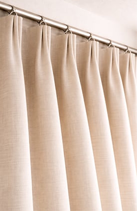 Soft pleat drapes Below image description: Gently rounded pleats create a relaxed, flowing drapery style.